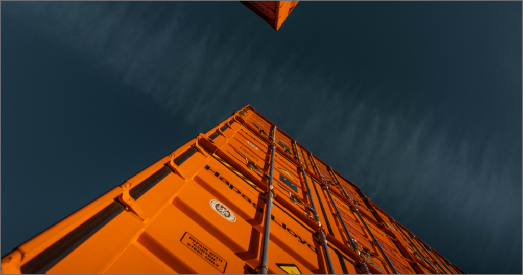 Orange Shipping Containers against blue sky