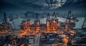 Container vessel unloading at port in Hong Kong