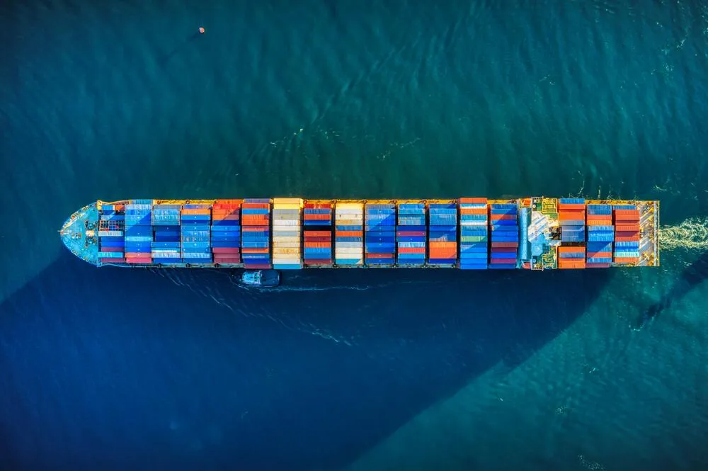 Sea freight vessel loaded with shipping containers