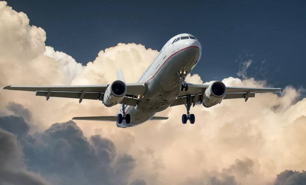 aeroplane flying through the clouds