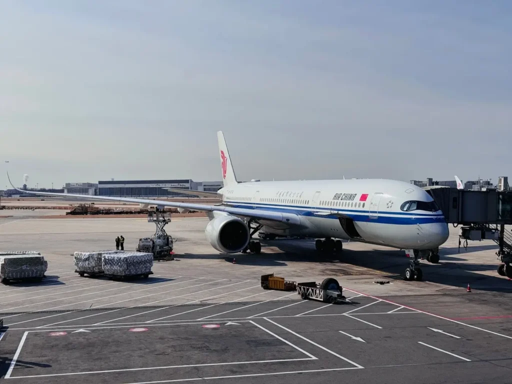 Air China Plane at airport for loading cargo and passengers