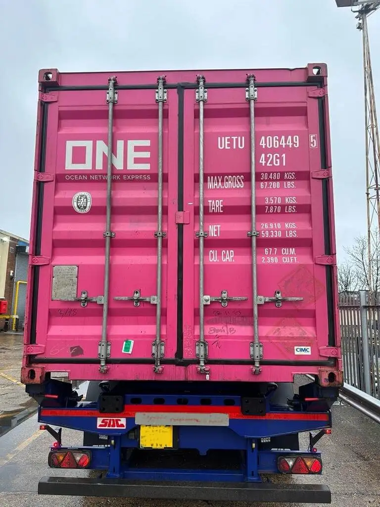 Sealed pink shipping container, for shipping from USA to UK