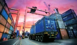 Truck under a crane at a shipping container port